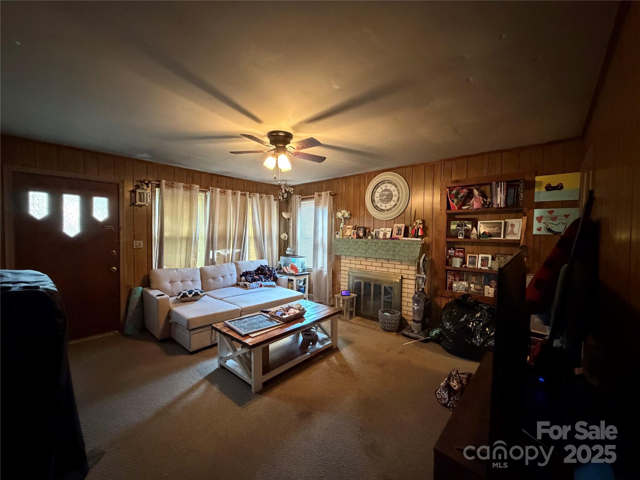 928 Bost Street Albemarle, NC 28001 - Photo 4 of 20 a building outdoor space with patio furniture and chandelier