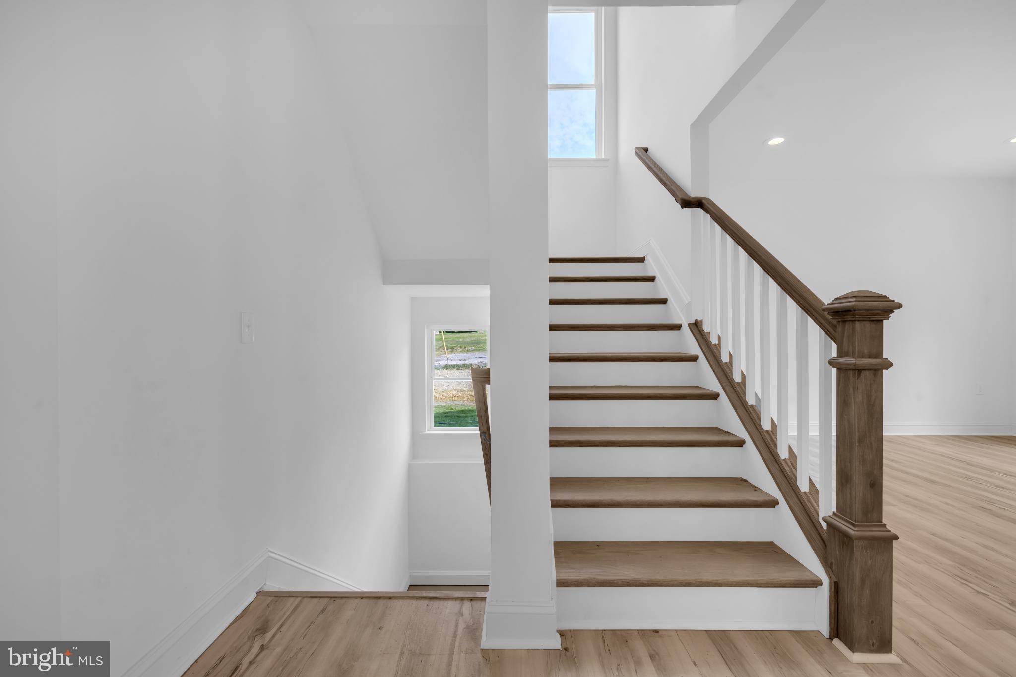 413 Trimble Road Joppa, MD 21085 - Photo 14 of 54 Bright and airy staircase invites exploration.