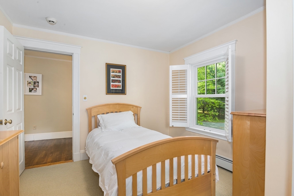 19 Whittier Road Wellesley, MA 02481 - Photo 12 of 23 a bedroom with a bed and a window