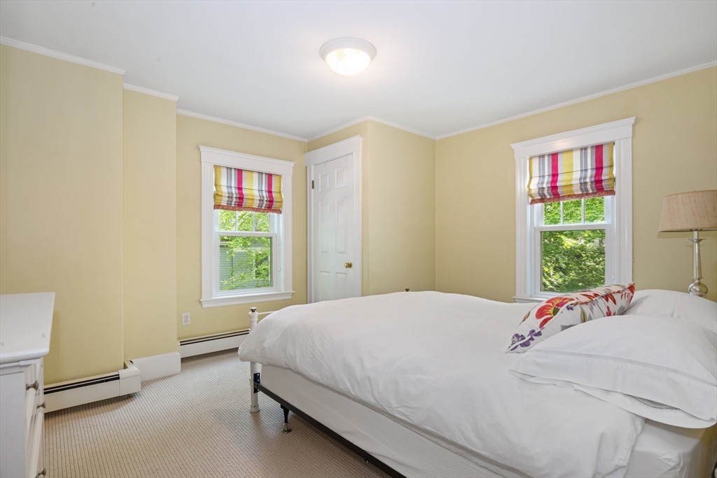 19 Whittier Road Wellesley, MA 02481 - Photo 14 of 23 a bedroom with a bed and a window