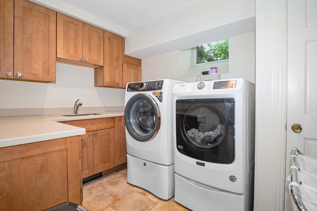 19 Whittier Road Wellesley, MA 02481 - Photo 17 of 23 a utility room with sink dryer and washer