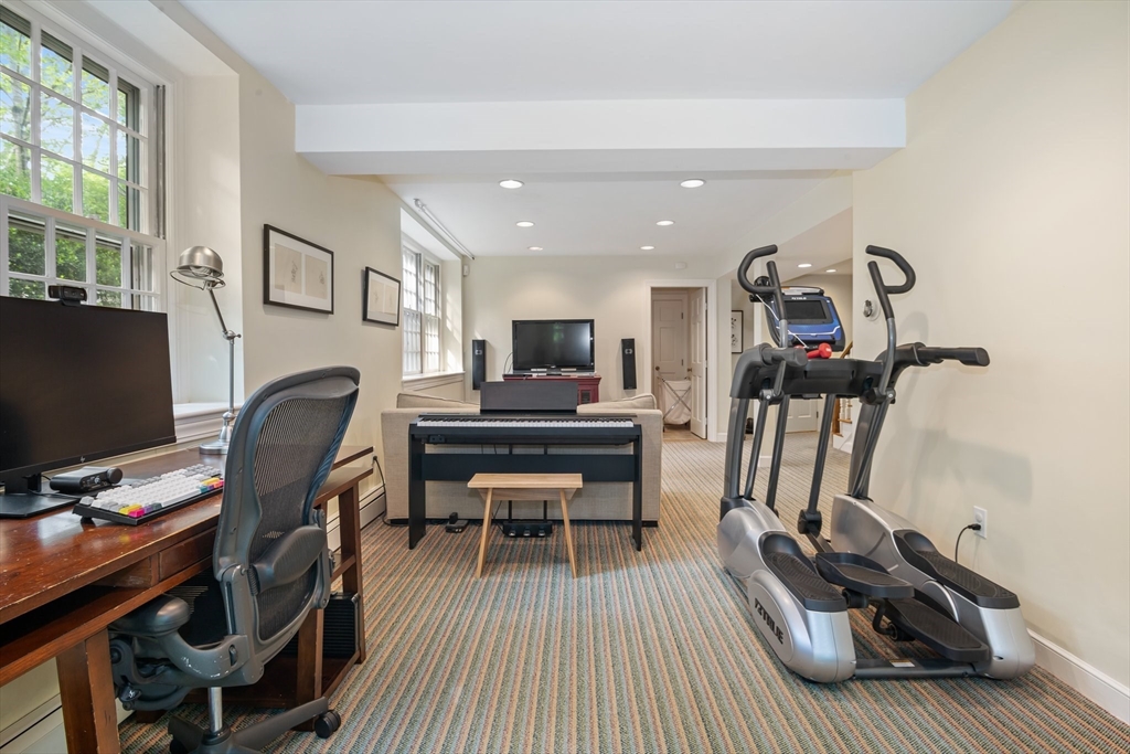 19 Whittier Road Wellesley, MA 02481 - Photo 19 of 23 a view of a workspace with furniture and gym equipment