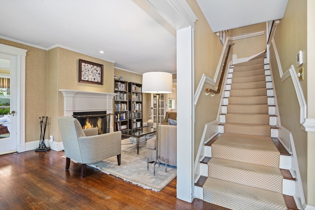 19 Whittier Road Wellesley, MA 02481 - Photo 3 of 23 a living room with furniture and a fireplace
