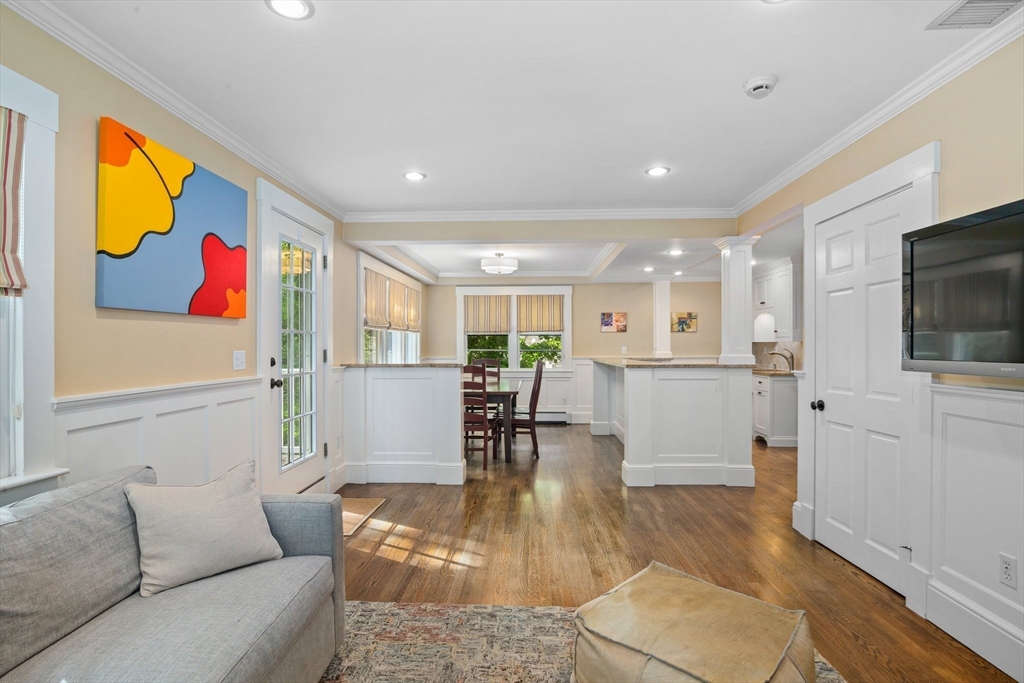 19 Whittier Road Wellesley, MA 02481 - Photo 10 of 23 a living room with furniture and a flat screen tv