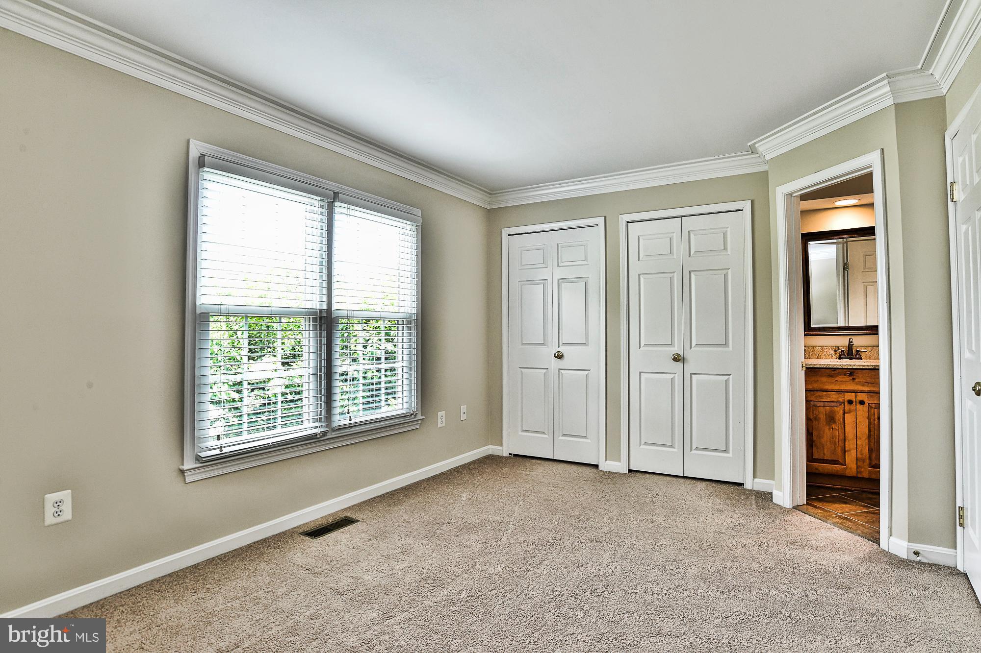 12817 Mill Brook Court Woodbridge, VA 22192 - Photo 16 of 34 a view of an empty room with closet and a window