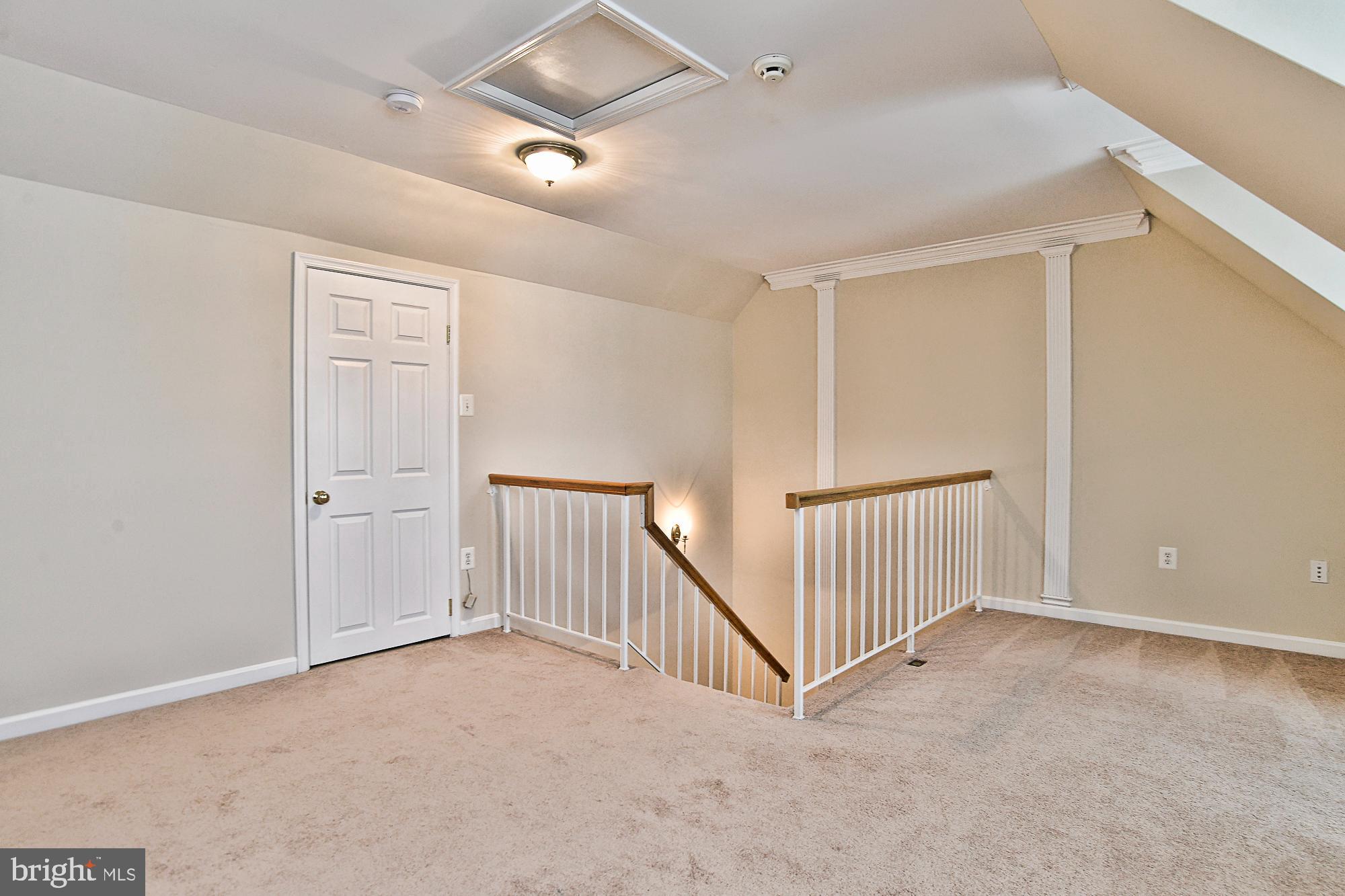 12817 Mill Brook Court Woodbridge, VA 22192 - Photo 25 of 34 a view of a livingroom with a ceiling fan and windows