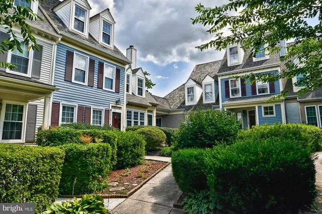 a front view of a multi story residential apartment building