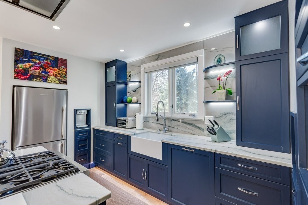 7 Brewer Street, Unit 2 Boston, MA 02130 - Photo 8 of 18 a kitchen with stainless steel appliances granite countertop a refrigerator and a sink
