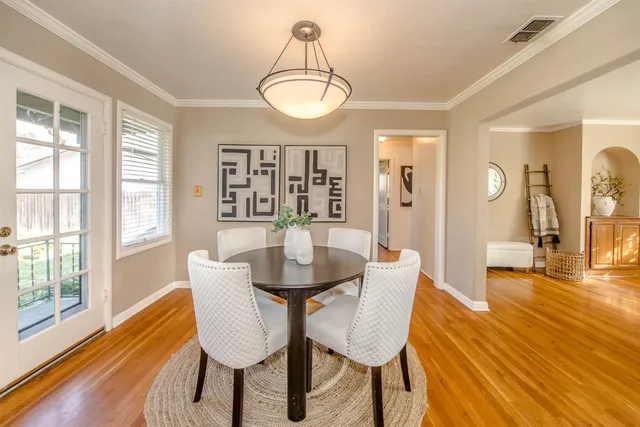 a kitchen with stainless steel appliances granite countertop a stove a sink refrigerator and a microwave