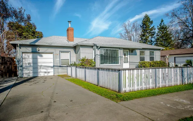 a front view of a house with a porch