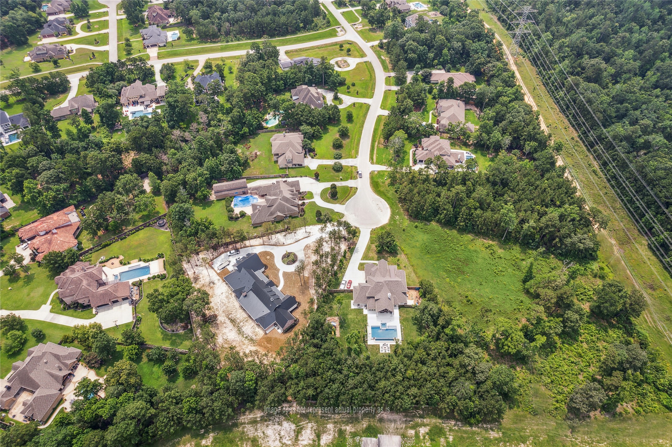 4406 Chateau Creek Way Spring, TX 77386 - Photo 11 of 14 an aerial view of residential house with outdoor space and swimming pool