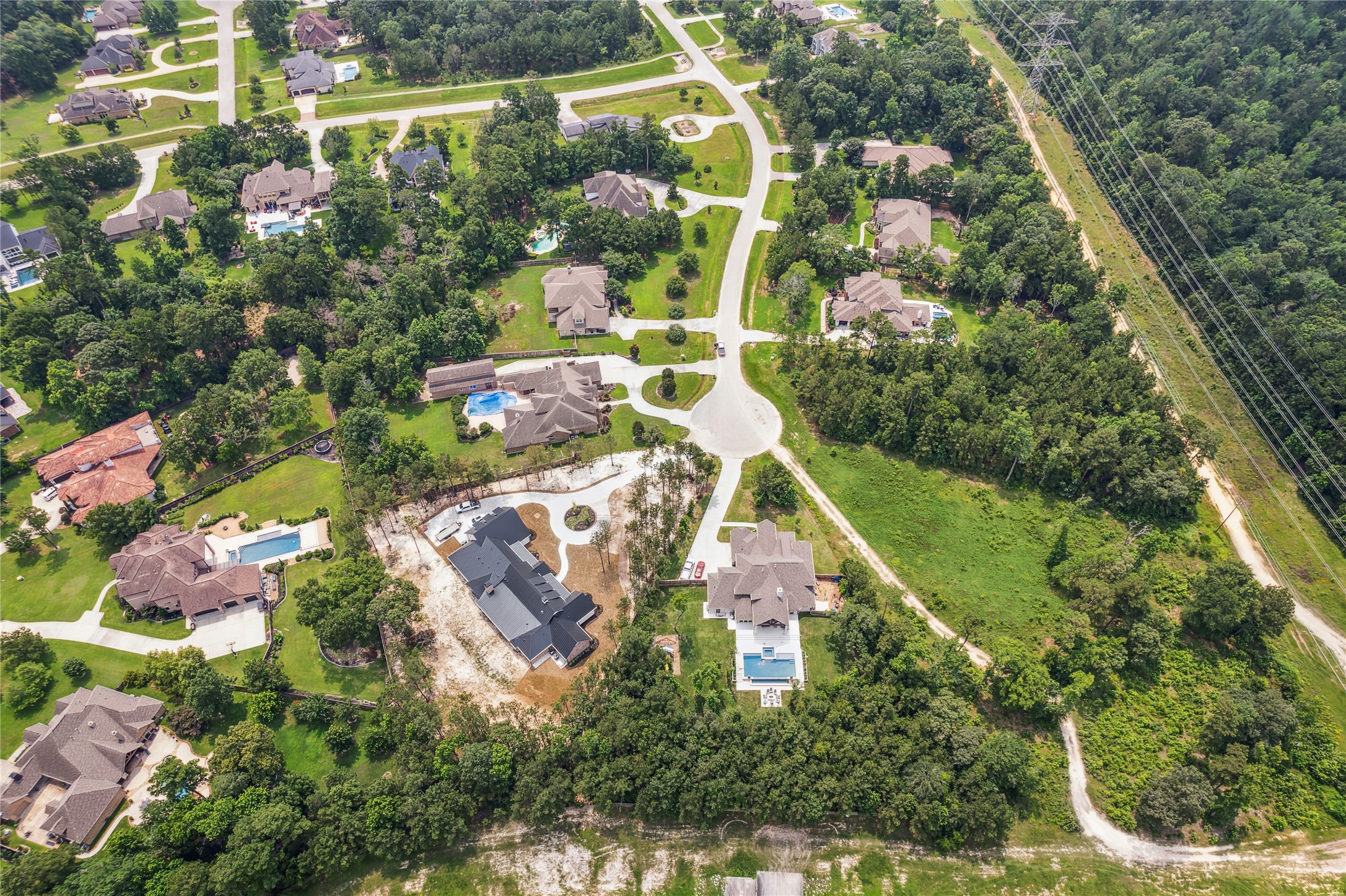 4406 Chateau Creek Way Spring, TX 77386 - Photo 13 of 14 an aerial view of residential house with outdoor space and swimming pool