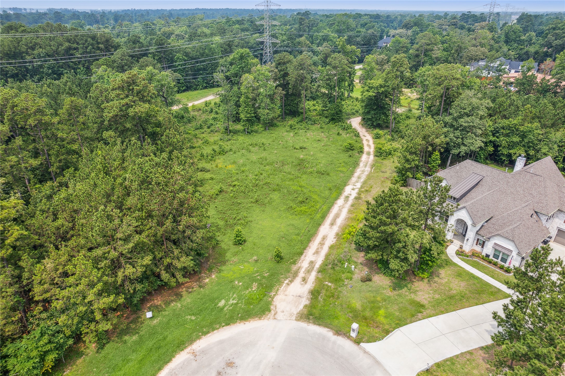 4406 Chateau Creek Way Spring, TX 77386 - Photo 4 of 14 a view of a yard with a house