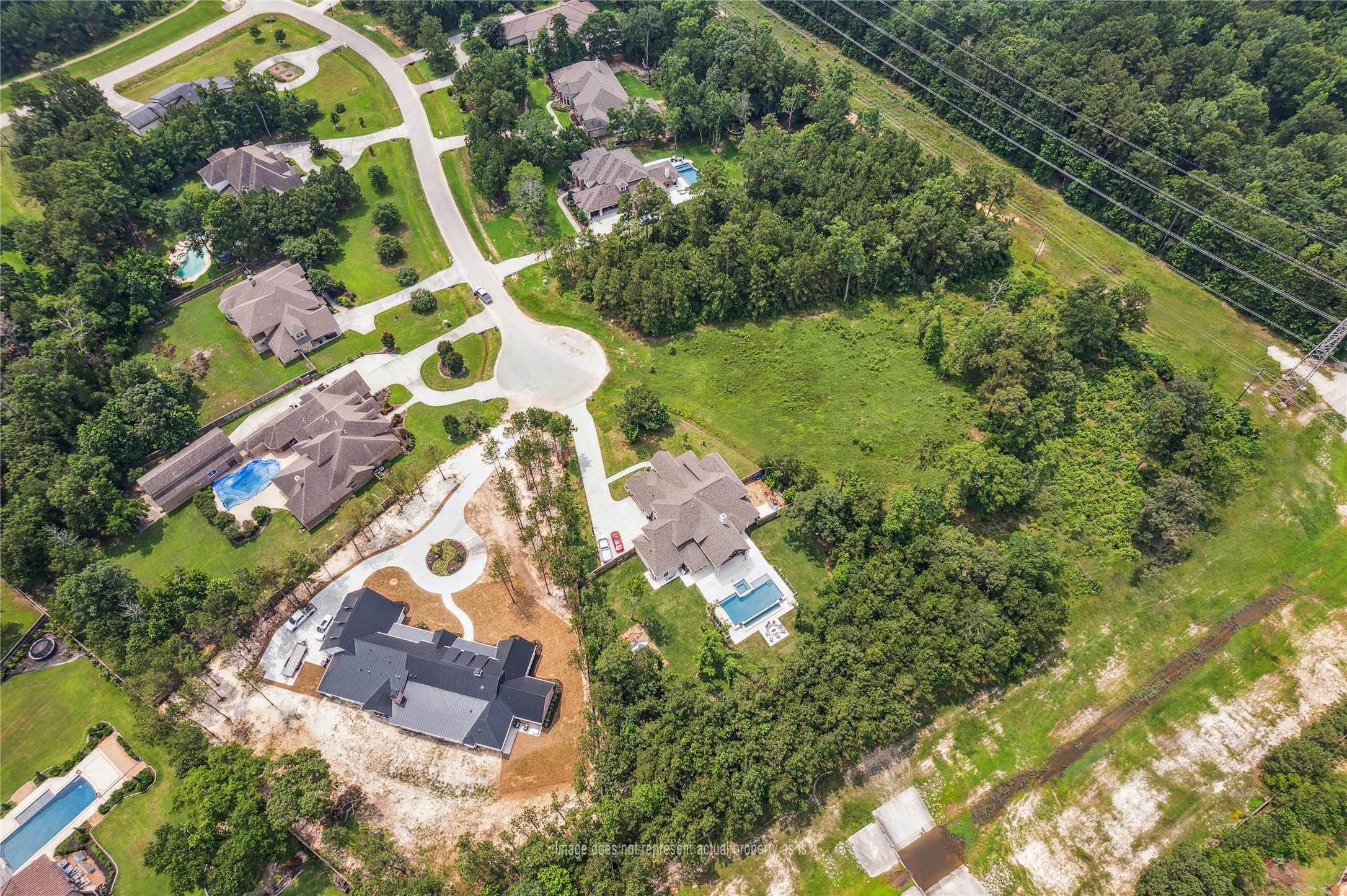 4406 Chateau Creek Way Spring, TX 77386 - Photo 7 of 14 a bird view of multi story residential houses with outdoor space
