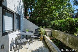 21 Canterbury Road, Unit 6 Great Neck, NY 11021 - Photo 27 of 32 a view of outdoor space and patio