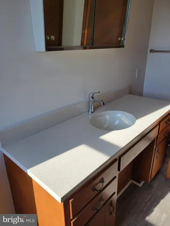 a kitchen with a sink and a stove