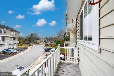 a room with a mirror and a sink
