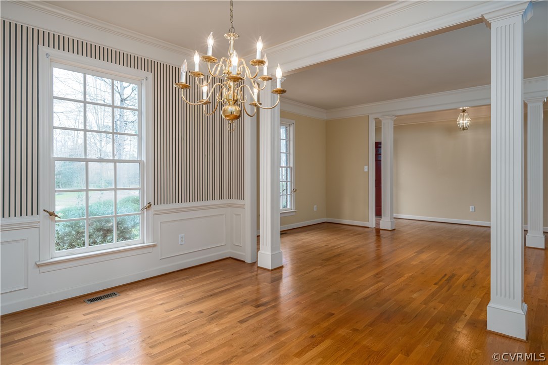 121 Broadmoor Williamsburg, VA 23188 - Photo 26 of 34 wooden floor in an empty room with a window