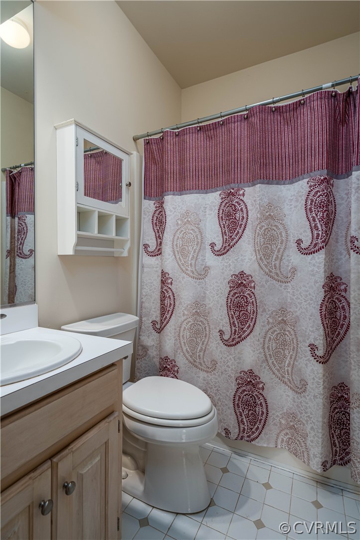121 Broadmoor Williamsburg, VA 23188 - Photo 34 of 34 a bathroom with a toilet sink and mirror