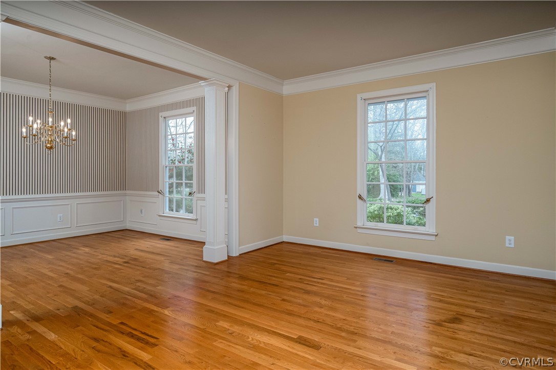 121 Broadmoor Williamsburg, VA 23188 - Photo 7 of 34 a view of an empty room with wooden floor and a window