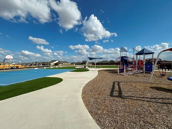 a view of a park with swings