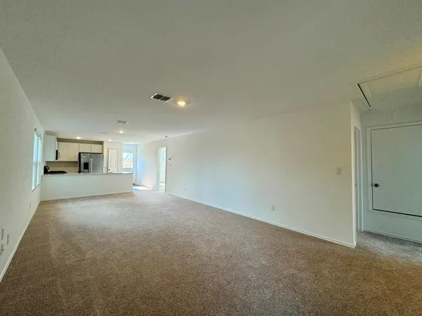 a view of empty room with a window