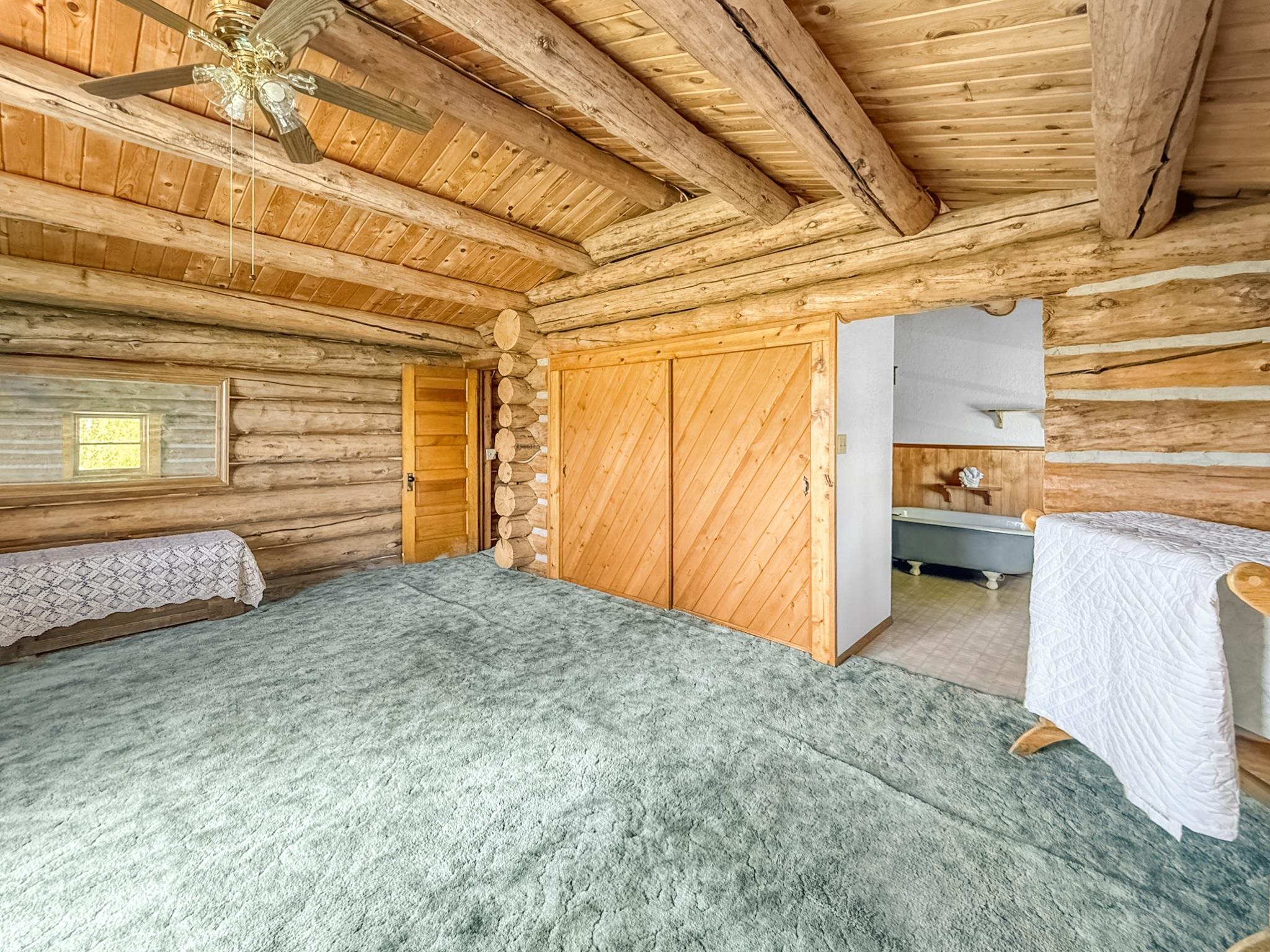 9709 3605 Road Hotchkiss, CO 81419 - Photo 10 of 42 a view of a room with closet and chandelier