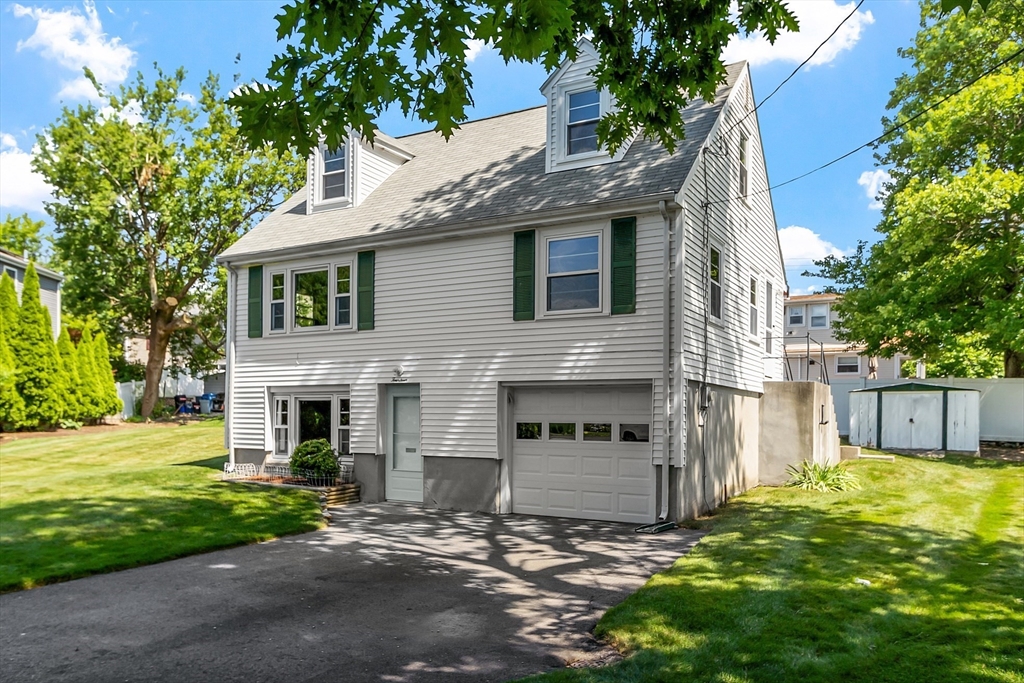 14 Meade Road Waltham, MA 02451 - Photo 1 of 29 a view of a house with a yard