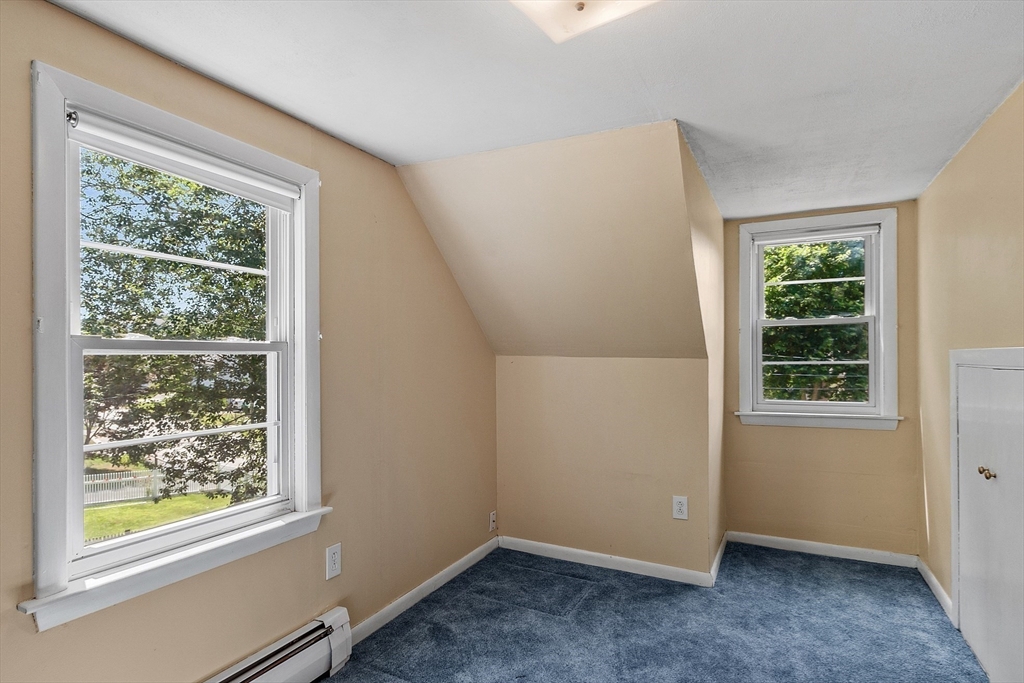 14 Meade Road Waltham, MA 02451 - Photo 17 of 29 an empty room with a window