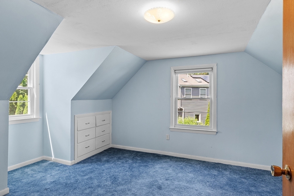 14 Meade Road Waltham, MA 02451 - Photo 20 of 29 an empty room with windows and closet