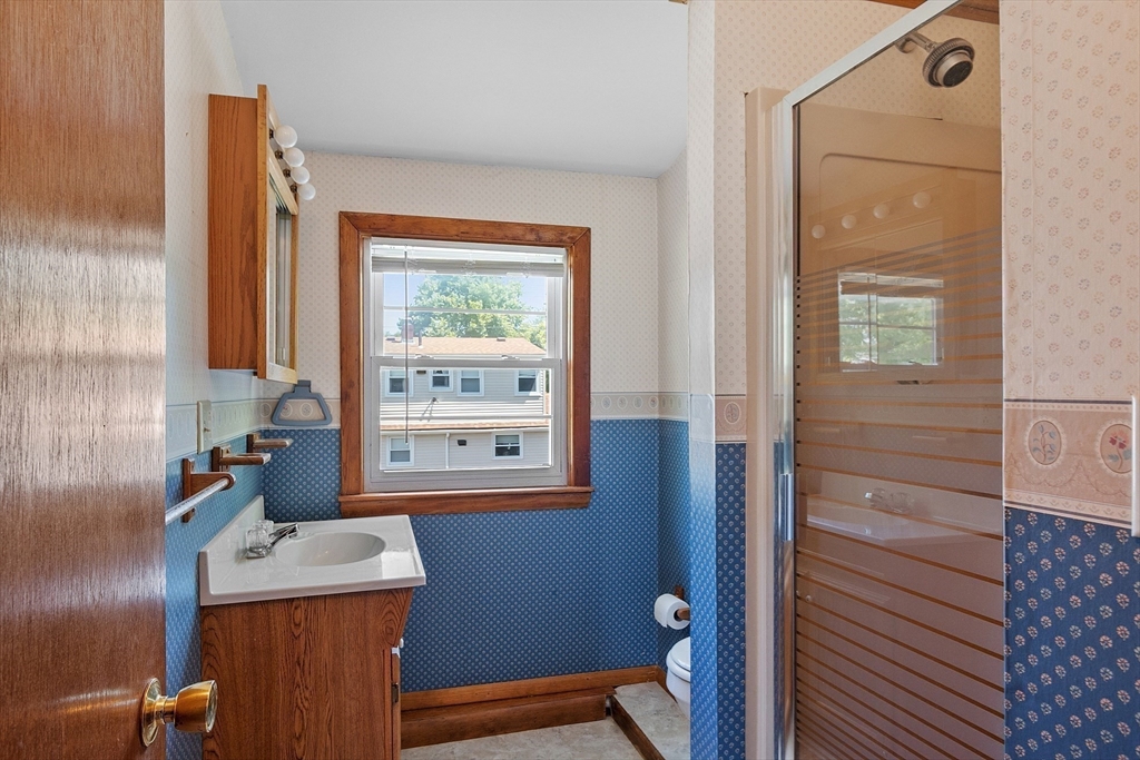 14 Meade Road Waltham, MA 02451 - Photo 21 of 29 a room with window and furniture