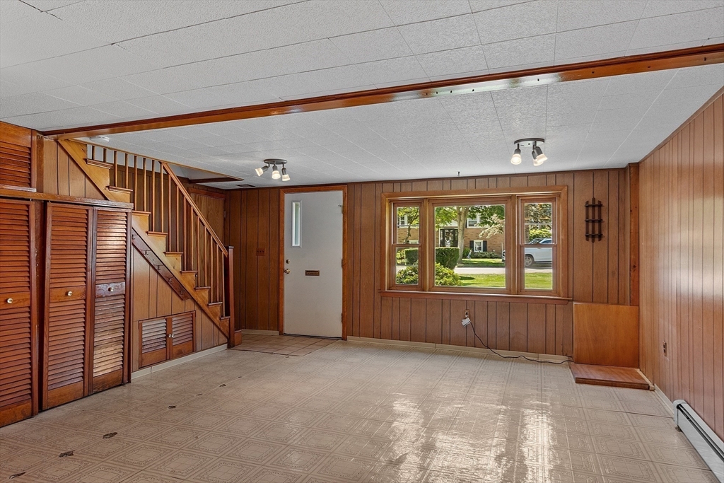 14 Meade Road Waltham, MA 02451 - Photo 25 of 29 a view of an empty room with windows & door