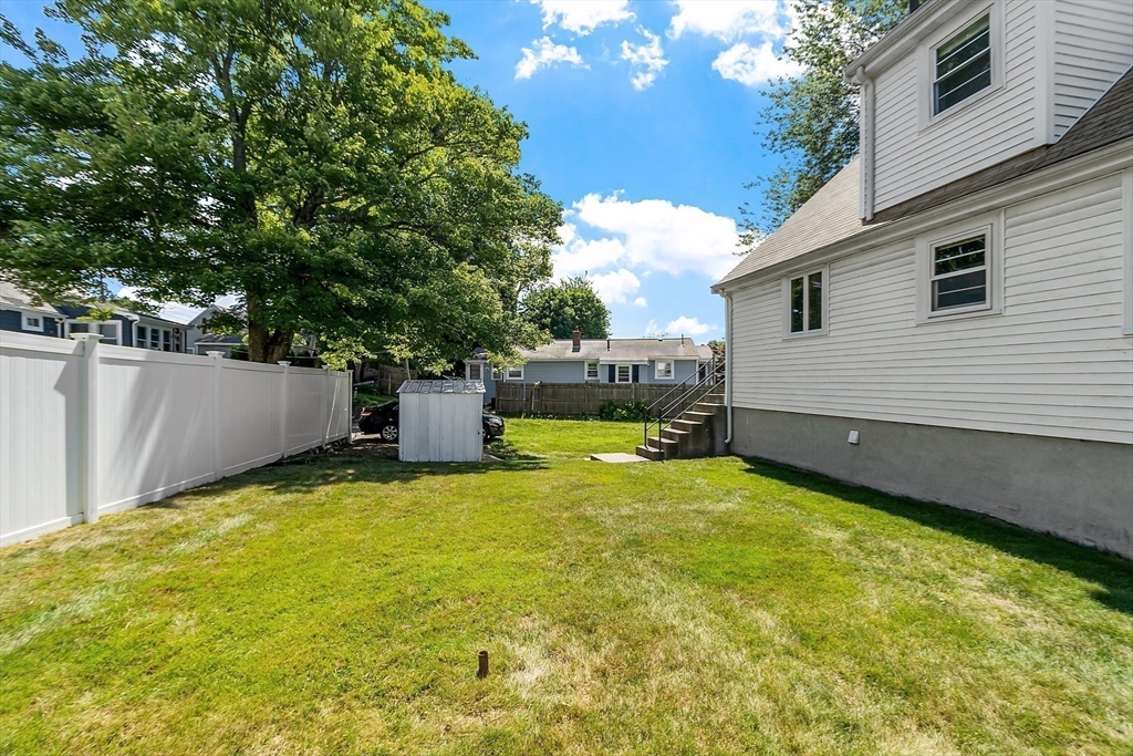 14 Meade Road Waltham, MA 02451 - Photo 27 of 29 a view of a backyard with swimming pool
