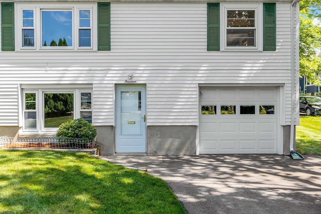 14 Meade Road Waltham, MA 02451 - Photo 3 of 29 a front view of a house with garden