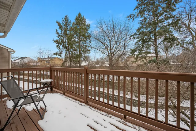 a view of a wooden roof deck