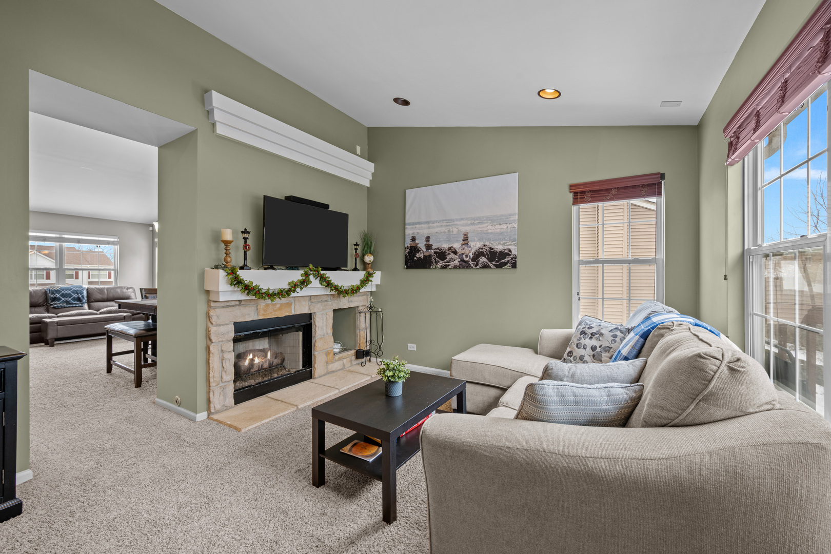 2448 Oneida Lane Naperville, IL 60563 - Photo 7 of 19 a living room with furniture and a fireplace