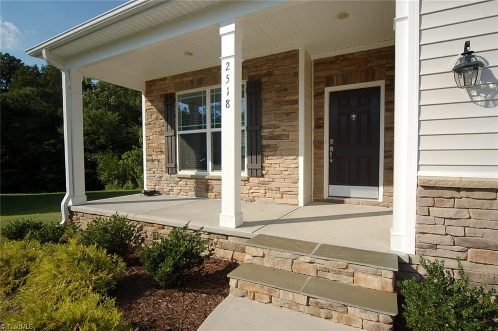2518 Copperleaf Court High Point, NC 27265 - Photo 2 of 30 Covered porch with stone detail
