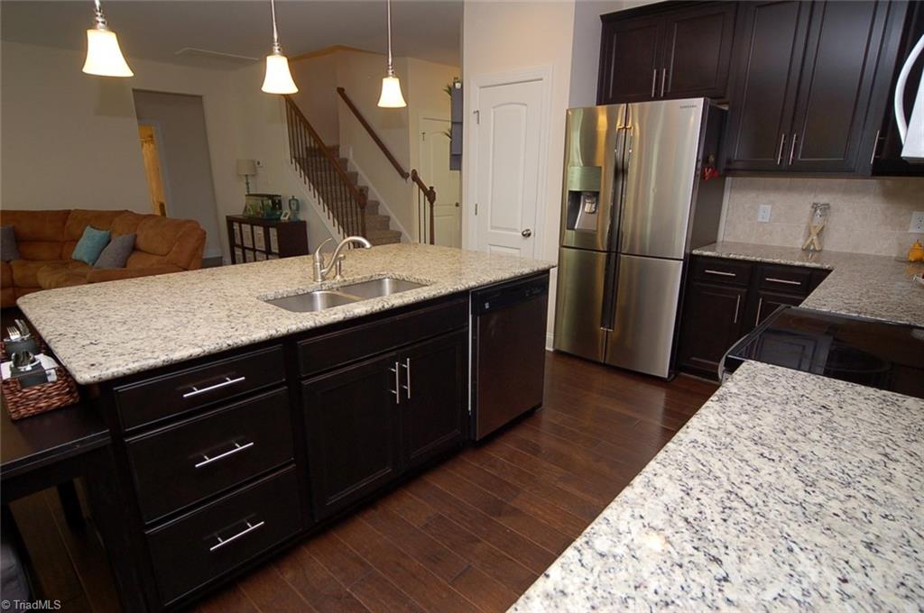 2518 Copperleaf Court High Point, NC 27265 - Photo 12 of 30 Plenty of counter space! The island gives you extra cabinet and drawer storage as well as an option for casual dining.