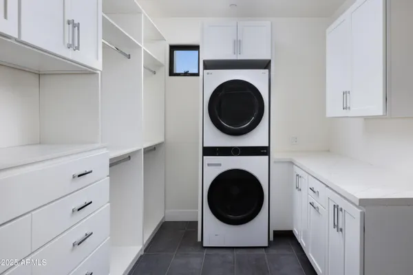 a room with cabinets and a window