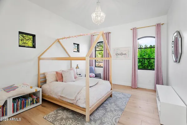 a view of swimming pool with seating area