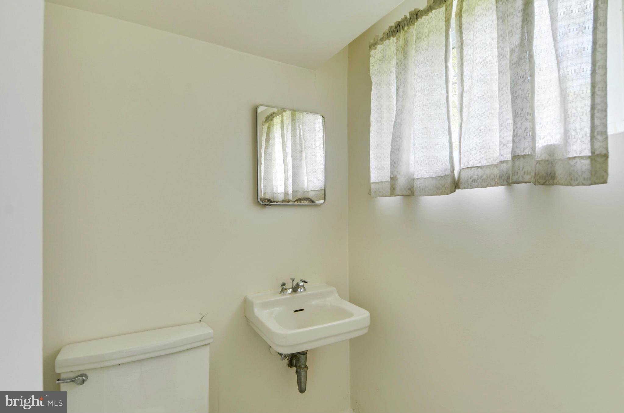 1503 Constance Street Silver Spring, MD 20902 - Photo 22 of 30 Powder Room in Lower Level