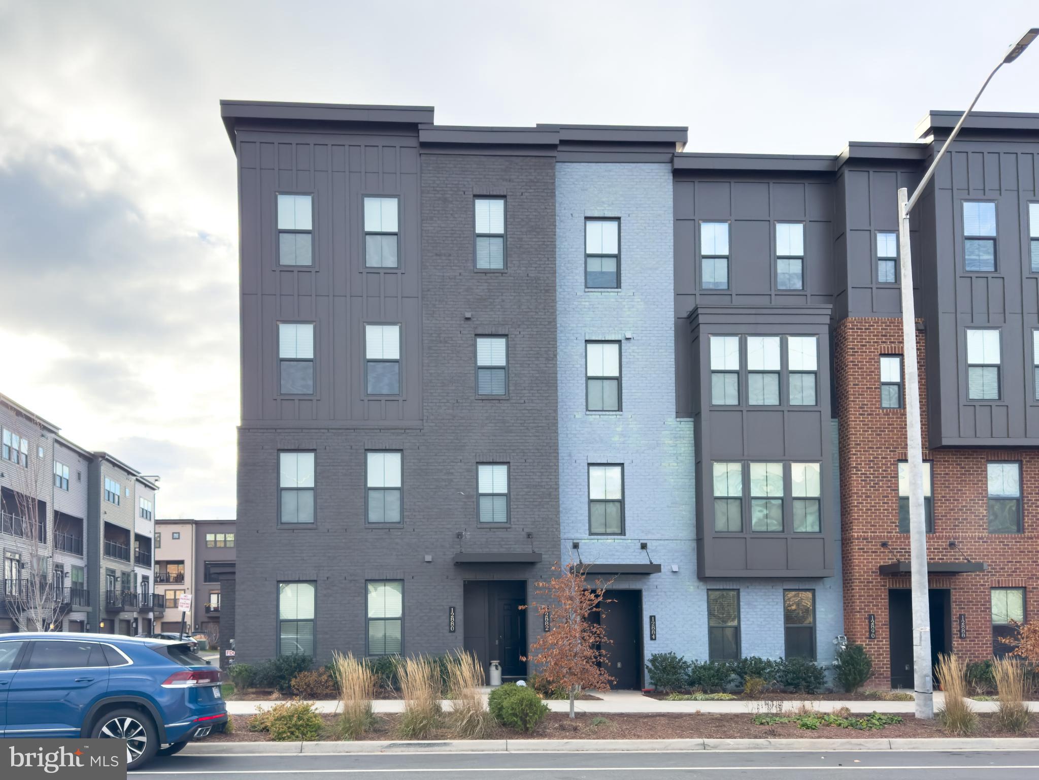 12882 Sunrise Alley, Unit 46 Herndon, VA 20171 - Photo 1 of 23 Modern townhomes with stylish facades.