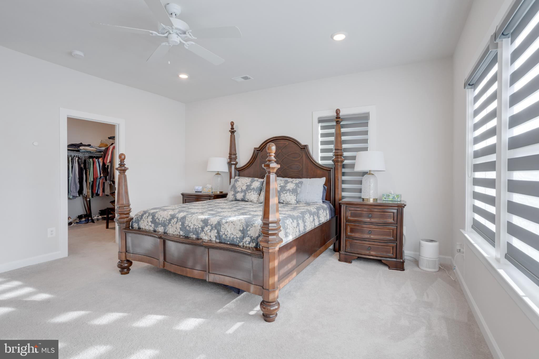 12882 Sunrise Alley, Unit 46 Herndon, VA 20171 - Photo 14 of 23 Elegant bedroom with natural light.