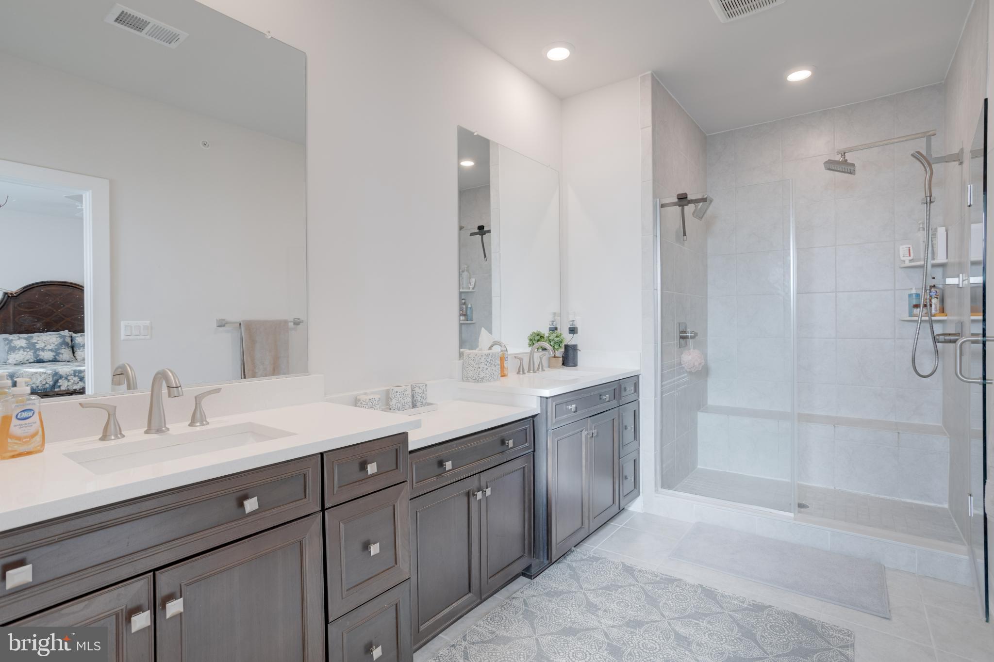 12882 Sunrise Alley, Unit 46 Herndon, VA 20171 - Photo 15 of 23 Sleek modern bathroom with elegant finishes.