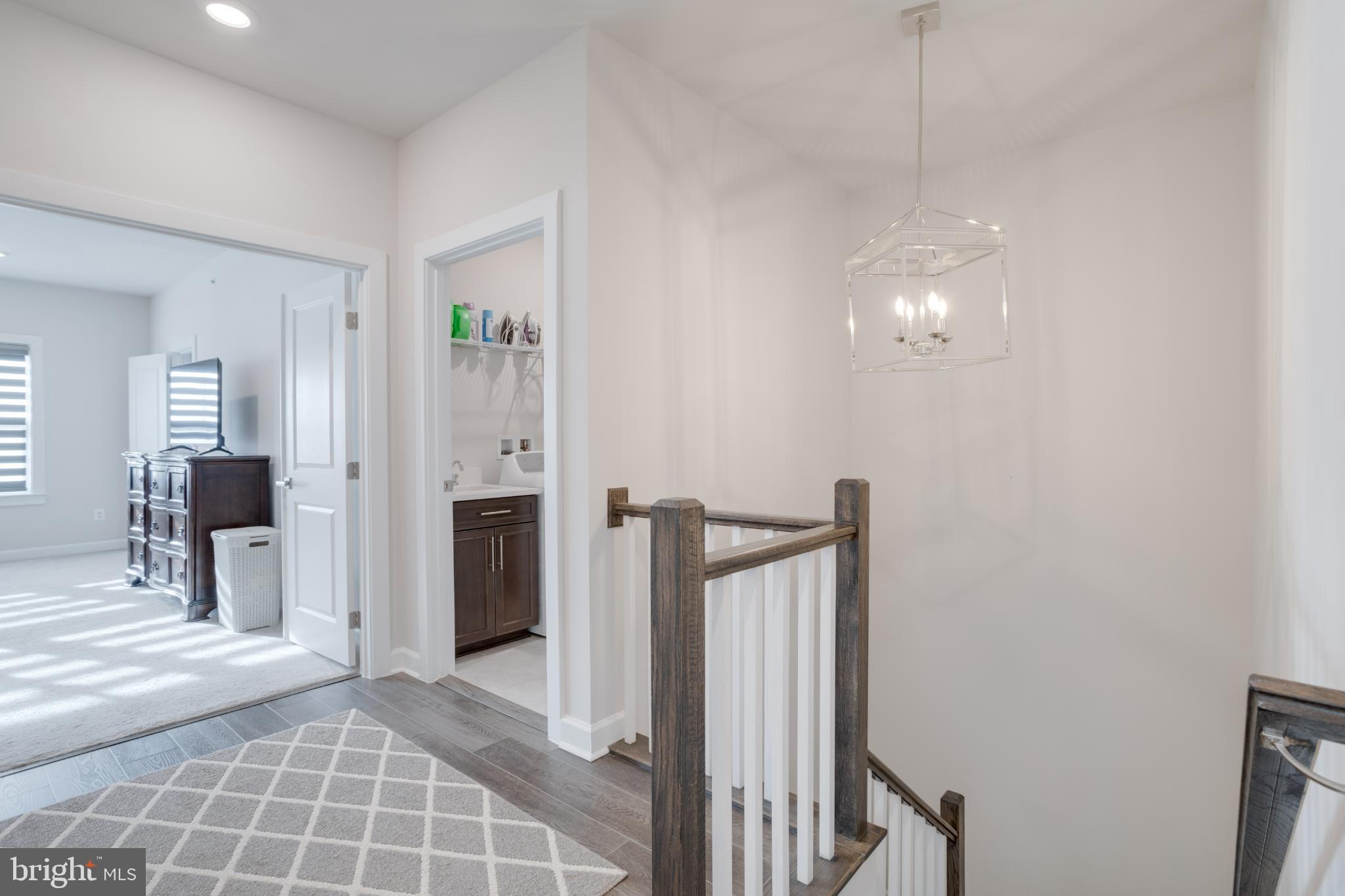 12882 Sunrise Alley, Unit 46 Herndon, VA 20171 - Photo 19 of 23 Bright and inviting hallway with modern charm.