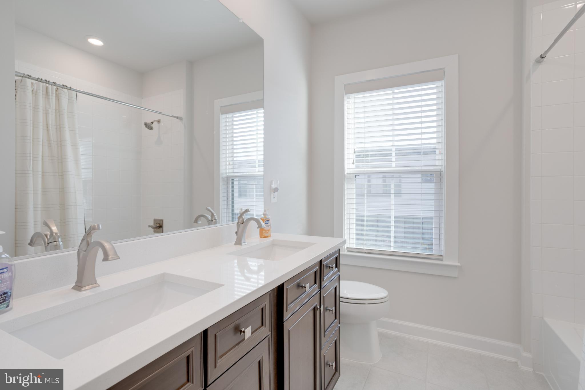12882 Sunrise Alley, Unit 46 Herndon, VA 20171 - Photo 20 of 23 Bright and airy modern bathroom retreat.