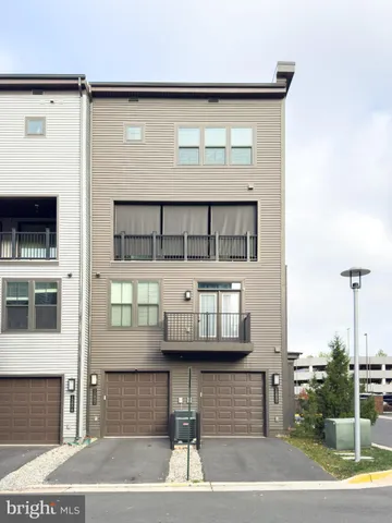 a tall building sitting on the side of a street