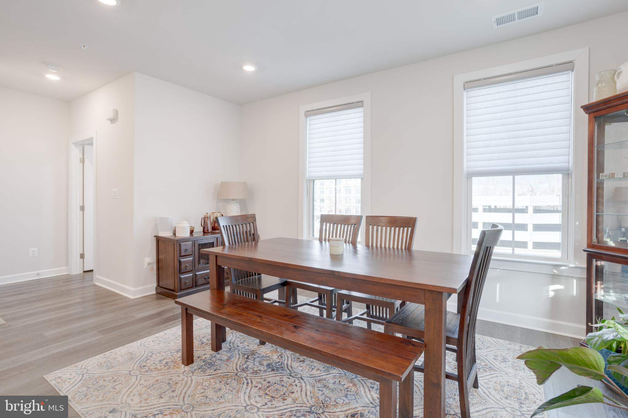 12882 Sunrise Alley, Unit 46 Herndon, VA 20171 - Photo 4 of 23 Bright and inviting dining space awaits.