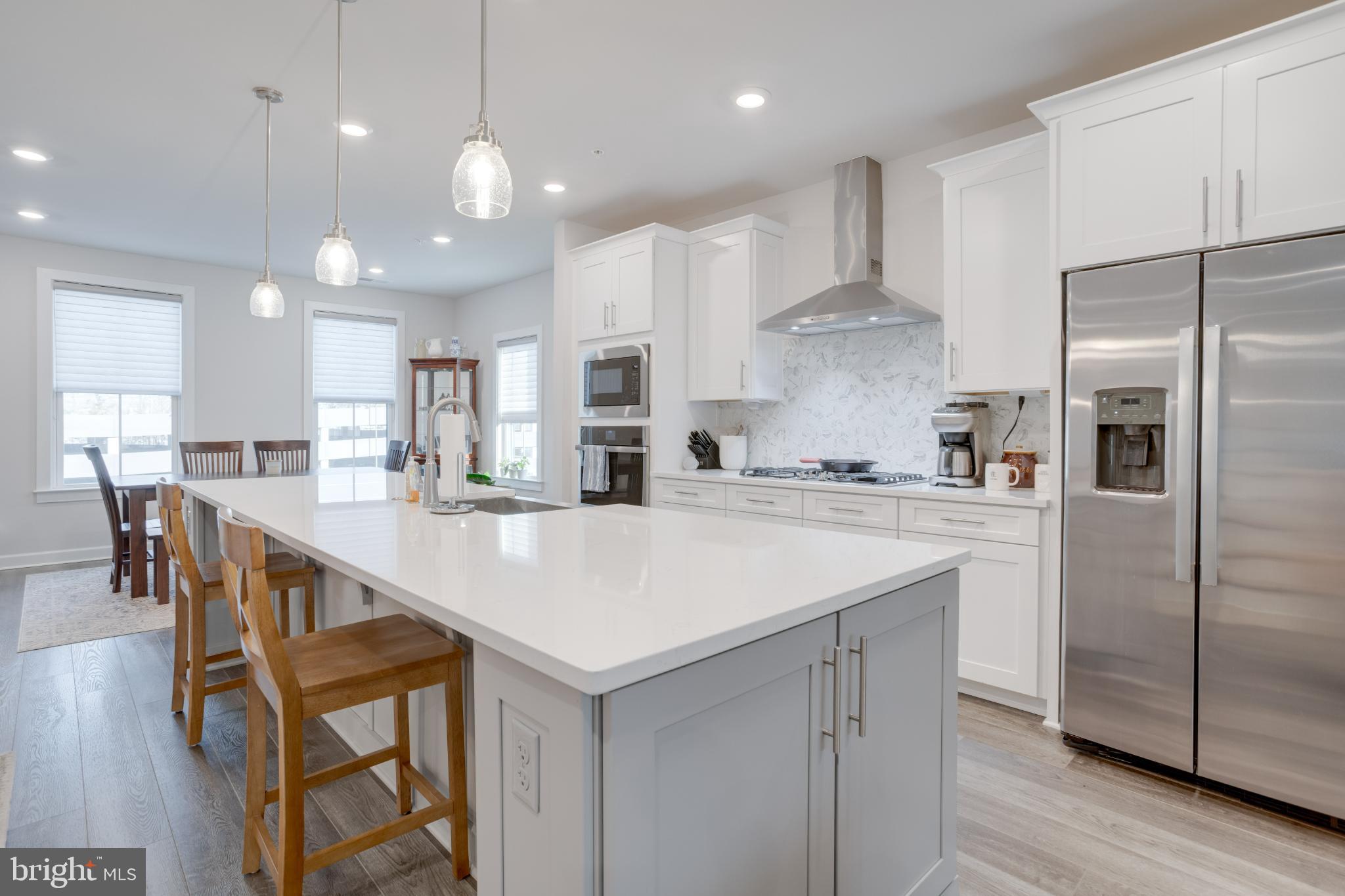 12882 Sunrise Alley, Unit 46 Herndon, VA 20171 - Photo 6 of 23 Modern kitchen with sleek design and light.