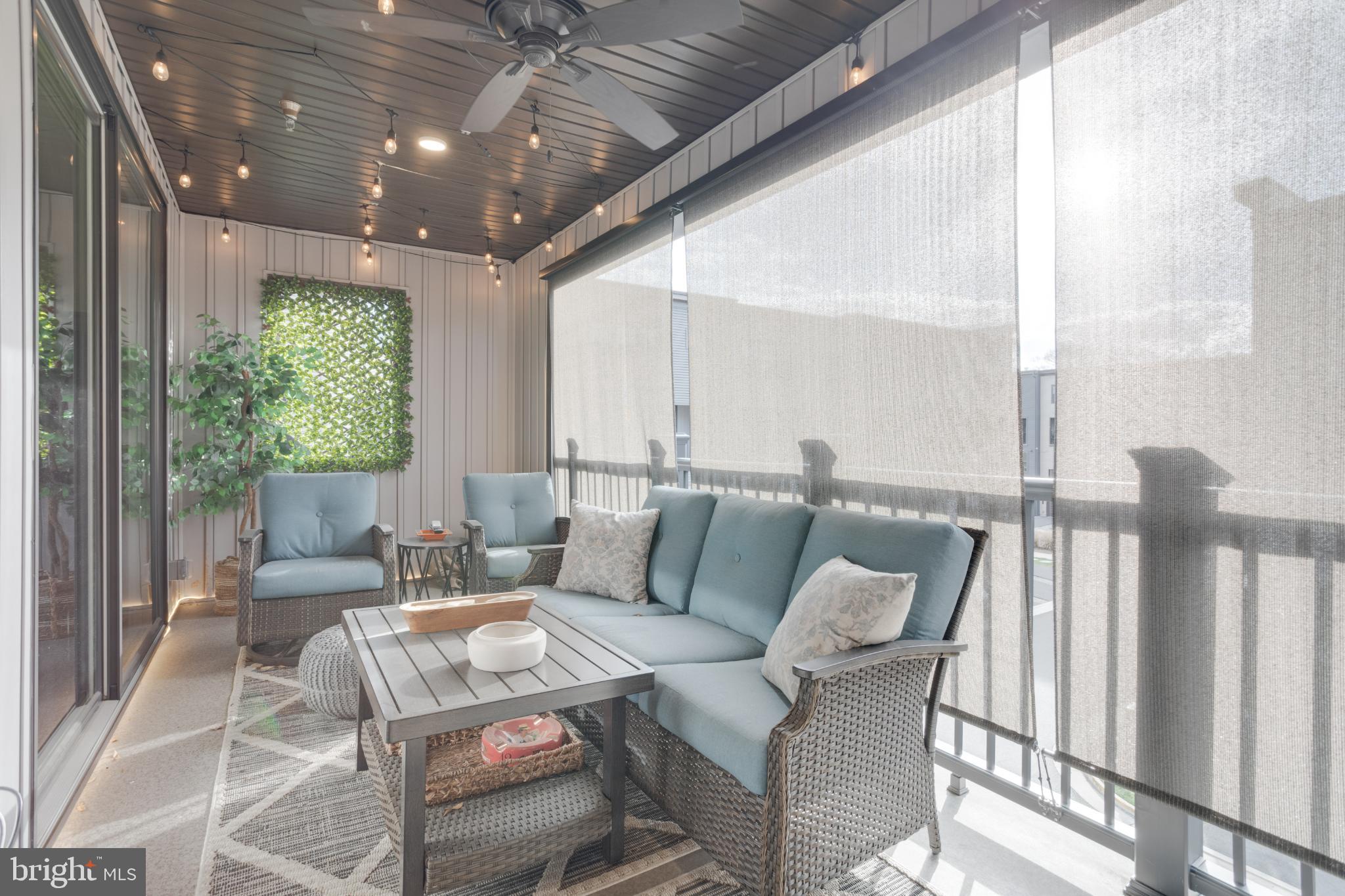 12882 Sunrise Alley, Unit 46 Herndon, VA 20171 - Photo 10 of 23 Serene outdoor retreat with cozy seating.